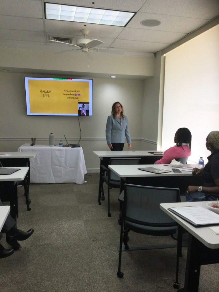 Rayna Schroeder presenting Thriving Leaders: Rediscover Joy & Boost Performance in Your Leadership. 