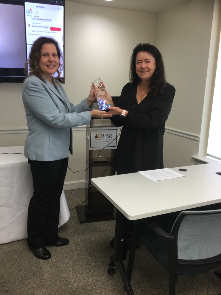 The Director of The Talbot Economic Development and Tourism, Ms. Cassandra Vanhooser presenting an award to our Keynote Speaker, Rayna Schroeder.